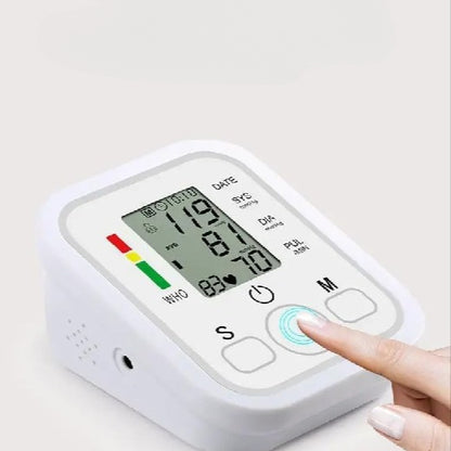 An elderly person using an automatic digital blood pressure monitor on their upper arm to check heart rate and BP levels.