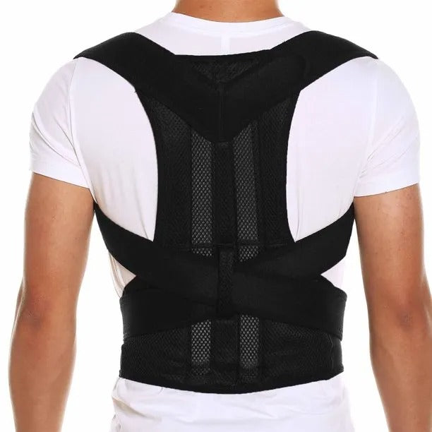 Close-up of a man wearing a black adjustable posture corrector belt over his t-shirt to fix rounded shoulders and hunchback.