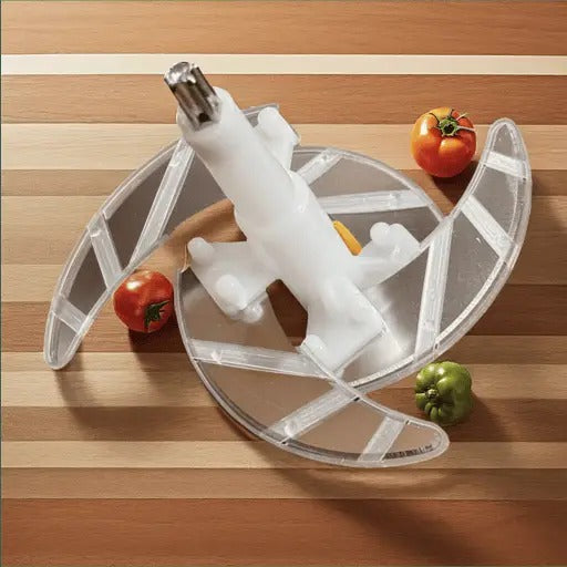 A person pressing down on a multifunctional vegetable chopper to instantly dice fresh onions and bell peppers into a clear container.