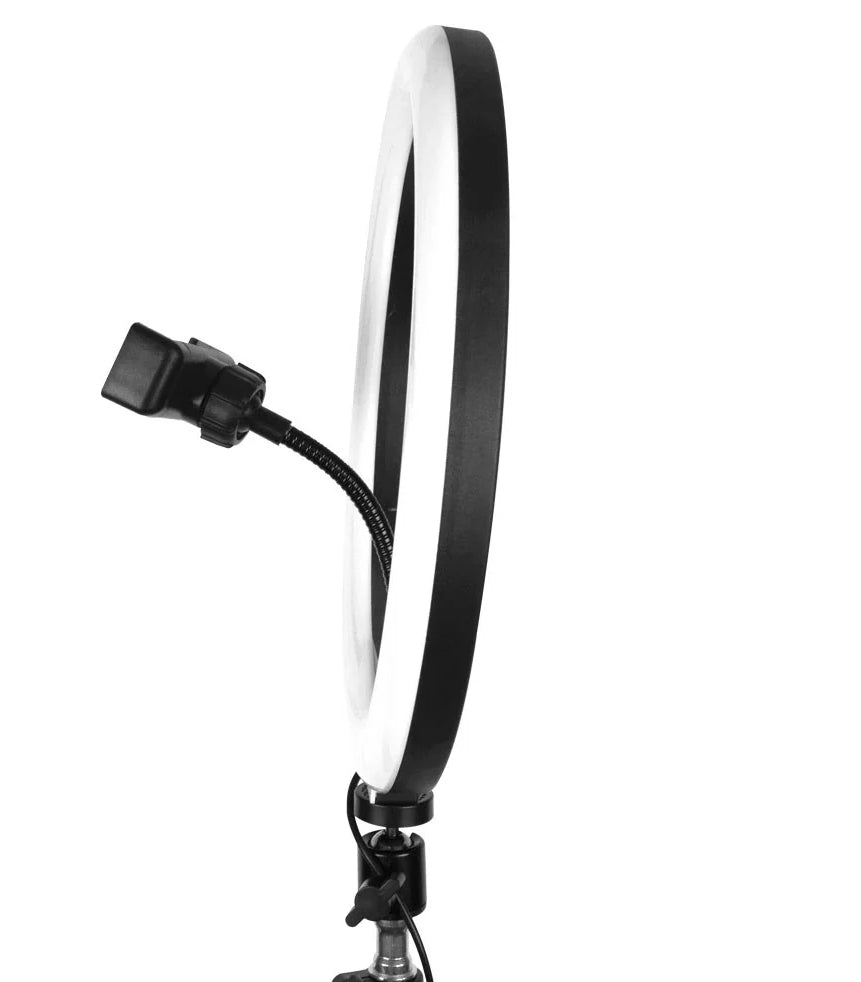 A lifestyle shot of a content creator filming a makeup tutorial using a 13-inch LED ring light with an iPhone mounted in the center holder.